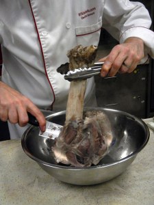 removing the meat from the shank bone