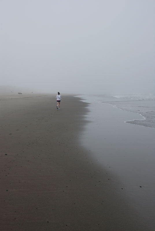 A runner on the beach in Oregon