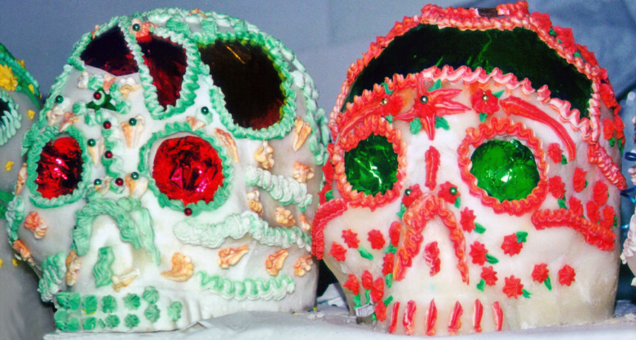 A couple of well-decorated sugar skulls